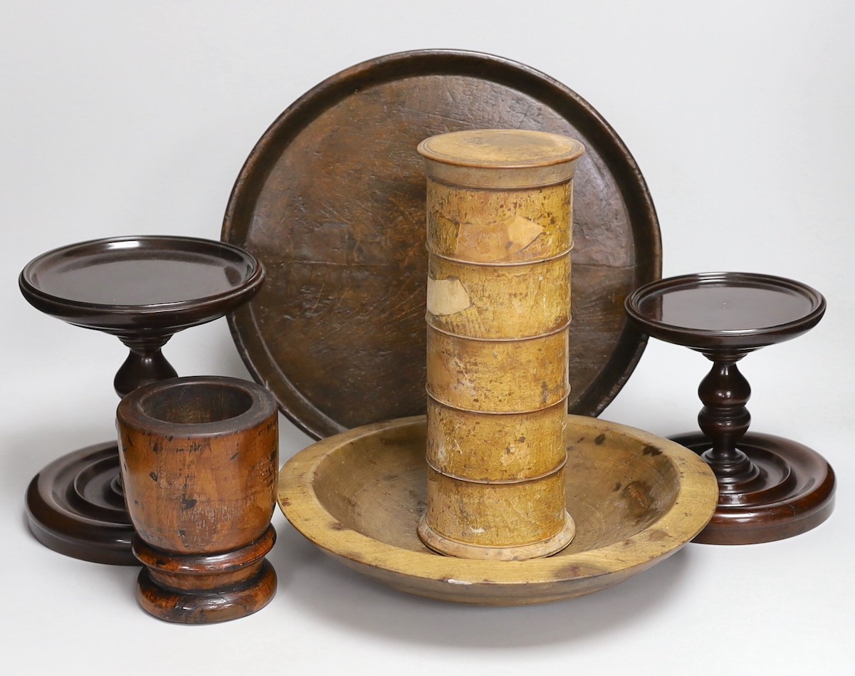 19th century and later treen including two mahogany candlestands, a spice tower and sycamore dish (6 in total)